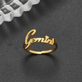 Macro detail of adjustable golden 18K stainless steel ring with Gemini cursive font - Adjustable Open / Gemini Gold