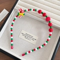 Handmade Christmas beaded headband featuring a candy cane charm in red, white and green - 5-Candy Cane Headband