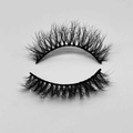 Close-up of thick multi-layered black false eyelashes with a natural soft texture - D805