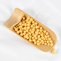 Realistic yellow PVC simulation hard wax beads presented in a natural bamboo scoop - Dried Soybeans (500g)