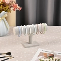 Gray velvet T-bar display stand showing colorful macaron resin bracelets in pastel tones - Flannelette / Single Layer / Gray