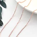 Macro detail of high-polish rose gold S925 sterling silver O-chain necklace links - Rose Gold Bare Chain
