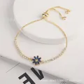 Adjustable gold sunflower bracelet featuring blue petals and white zircon stones - Blue Flower