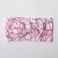 Detail showing soft nylon baby headband with red baseball stitch pattern and bow knot - White Red Baseball Line