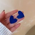 Navy blue flocked heart stud earrings held in hand to demonstrate size and velvet texture - 41# Silver Needle - Blue Flocking Heart Studs