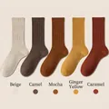 Five pairs of cotton mid-calf socks in beige, camel, mocha, ginger, and caramel colors - One Size