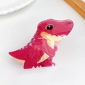 Cute pink acrylic dinosaur hair clip with blue spots and smooth glossy acetate texture - T-Rex