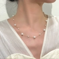 Elegant gold plated station necklace with alternating size pearls on a fine chain - Alternating Size Pearl Necklace