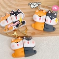 Cute Shiba Inu couple keychains in yellow and black with magnetic hugging feature - Puppy Hug (Magnetic)