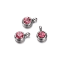 Close-up of three silver-tone round pendants with pink crystals for DIY earring making - 10 Pieces per Pack / Steel Border Deep Pink Stone