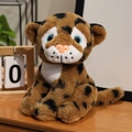 Cute plush leopard doll in sitting pose with black spots and big blue eyes - 17cm / Brown With Black Spots