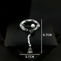 Detail of snake brooch with pearls and zircon, dimensions measuring 6.7cm by 3.7cm - Gray Enamel Snake