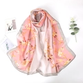 Pink silk scarf with gold floral patterns and 100% silk label on a clean white backdrop - 150*50cm / Pink