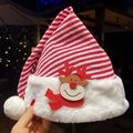 Knitted red and white striped Christmas hat featuring a felt reindeer and plush trim - Scarf Reindeer Red Striped Christmas Hat