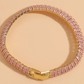 Detail of double-row pink zircon bracelet with 14K gold plating and secure safety clasp - Pink