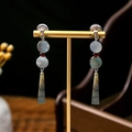 Macro detail of Chinese style long tassel earrings with gray shell and red bead accents - Grey Shell Red Bead Long Style Ear Clip (E1006-1/Ear Clip)