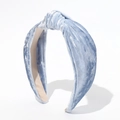 Detail view of the knotted blue velvet headband with a soft beige inner lining - Velvet Knotted Style / Blue