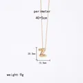Close-up of gold Z-shaped pendant necklace showing precise measurements and 9g weight - Letter Z