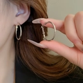 Close-up of minimalist silver pearl hoop earrings worn by a model to show elegant fit - 25mm Silver Round Hoop Style (66#)