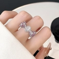 Detail of silver butterfly ring featuring purple pavé zircons and a central drop stone - Silver Fuchsia Teardrop Bowknot