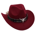 Detailed macro view of burgundy felt cowboy hat with ethnic band and silver bull skull charm - 52-54cm / Burgundy