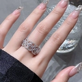 Detail of hollow lace silver ring with micro-pave cubic zirconia on hand - Hollow Lace Pave (JZ3883)