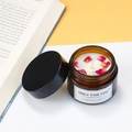 Brown amber jar soy candle with dried rose petals and black screw cap lid - Rose Petals