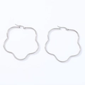 Macro detail of silver stainless steel hoop earrings with wavy petal-shaped edges - Plum Blossom (Steel Color)