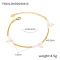 Elegante bracciale in acciaio al titanio dorato con perle barocche e chiusura a moschettone - Bracciale / Oro