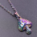 Macro shot of rainbow-colored mushroom pendant with textured details on a black surface - Rainbow Necklace Set