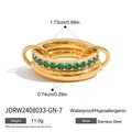 Detail view of gold stainless steel ring with green crystals and dimension markings - US 7 / Gold with Green Zirconia