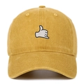 Close-up of vintage mustard yellow washed cotton baseball cap with white shaka embroidery - Yellow