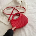 Chic red pleated saddle bag with round handle and adjustable shoulder strap - Red