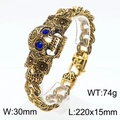 Bracelet punk squelette doré avec yeux en pierres bleues et maillons sculptés - Style Or Yeux Bleus (KB169235-KJX)