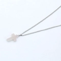 Detail shot of a delicate silver chain with a translucent pink natural stone cross pendant - Clear White