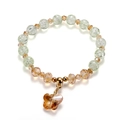 Beaded bracelet featuring green crackle glass beads and an amber glass butterfly charm - Butterfly Style / Green