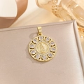 Detail of gold Virgin Mary pendant with colorful cubic zirconia on a jewelry box - Gold Round Virgin Mary Pendant With White Zirconia