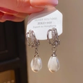 Macro detail of silver 925 bow pearl earrings featuring sparkling zircon inlay accents - Silver Pearl Waterdrop (22#)