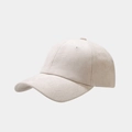 Side view of beige suede baseball cap showing fine brushed texture and 6-panel crown - White