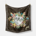 Detailed view of dark brown silk scarf featuring celestial lunar and zodiac patterns - Brown
