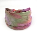 Detail of bohemian tie-dye cotton sports headband with seamless stretch design and vibrant colors - 80-Multi Tie Dye