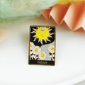 Tarot The Sun gold charm pendant with black enamel finish and white floral details - The Sun-Sunflower
