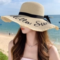 Beige straw sun hat with black bow and Hello Sun embroidery for beach vacations - Large Brim Embroidery Beige