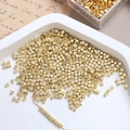 Macro shot of 14k gold plated faceted cube beads for DIY handmade jewelry crafting - 2mm 14k Gold (10 Pcs)