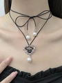 Gothic punk heart pendant necklace featuring black ribbon and elegant white pearls - Black Ribbon Lace-up Barbed Heart Choker (N-236)