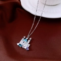Detail of silver castle pendant necklace with multicolored gemstones on red satin - Silver - Castle Necklace (WN1889)