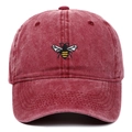 Detailed embroidery of a bee on a vintage washed red cotton baseball cap - Burgundy
