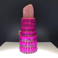 Detail showing lipstick-shaped evening clutch with pink and magenta rhinestones - Rose Red