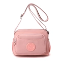 Pink waterproof nylon crossbody bag with multi-layer zipper pockets and adjustable strap - Cherry Pink