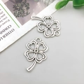 Set of two hollow four-leaf clover silver alloy pendants for DIY jewelry making - Hollow Heart Four-leaf Clover 15x25mm